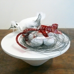 Remove Before Flight #1, 2009, Mixed Media, Wire, Acrylic Painted Plastic Eggs, Airplane Surplus, Paper Maché Bird,  20 x 18 x 18 inches (50.8 x 45.72 x 45.72 cm)