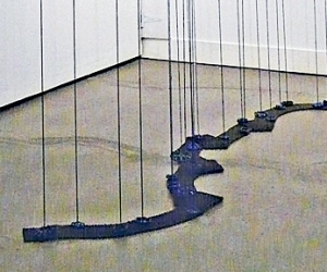 21 Attenuations • Installation, Acrylic on Wood Panel, Acrylic Painted Strings, Faucet Valves and Industrial Steel Mesh, Variable Height up to 240 x 96 x 48 inches (up to Height of 609.6 x 243.84 x 121.92 cm)
