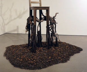 Deception • Detail Lower • 2017 • Mixed Media Black Walnut Branch, Found Chair, Acrylic Paint, Sumac Roots and Faux Roots, Black Walnuts, Potting Soil • 112 inches x 70 inches x 60 inches (285 cm x 178 cm x 122 cm)